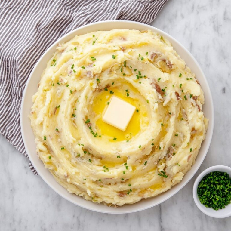 Roasted Garlic Mashed Potatoes with Fresh Thyme and Chives Recipe